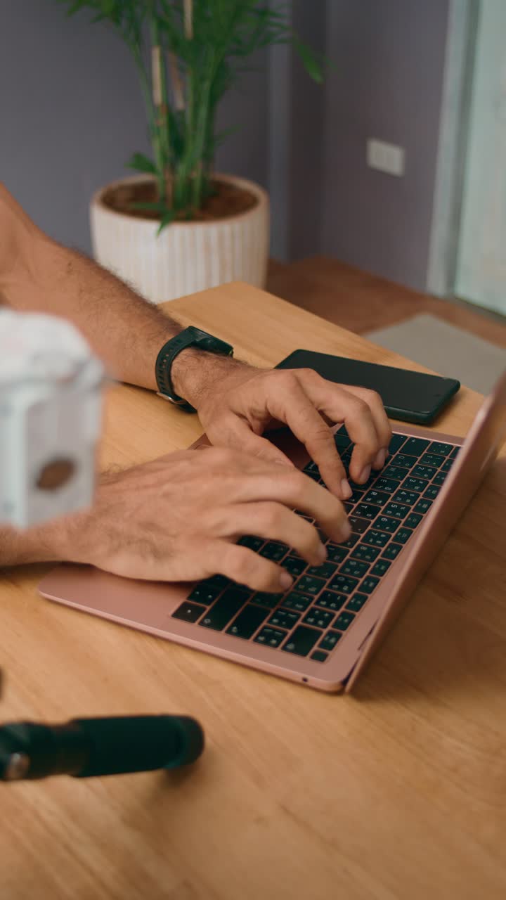 Person Working from Home on Laptop