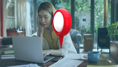 woman typing on laptop for remote work, integrating floating map-pin with documents, phone and mug