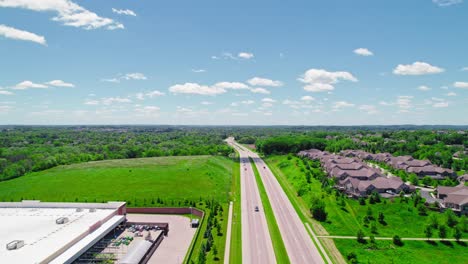 erial view of sussex, wisconsin's scenic highway and residential area