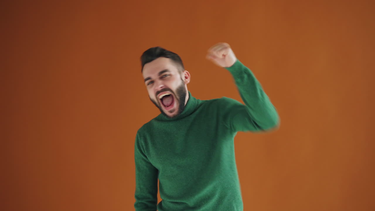 Happy Man in Green Sweater