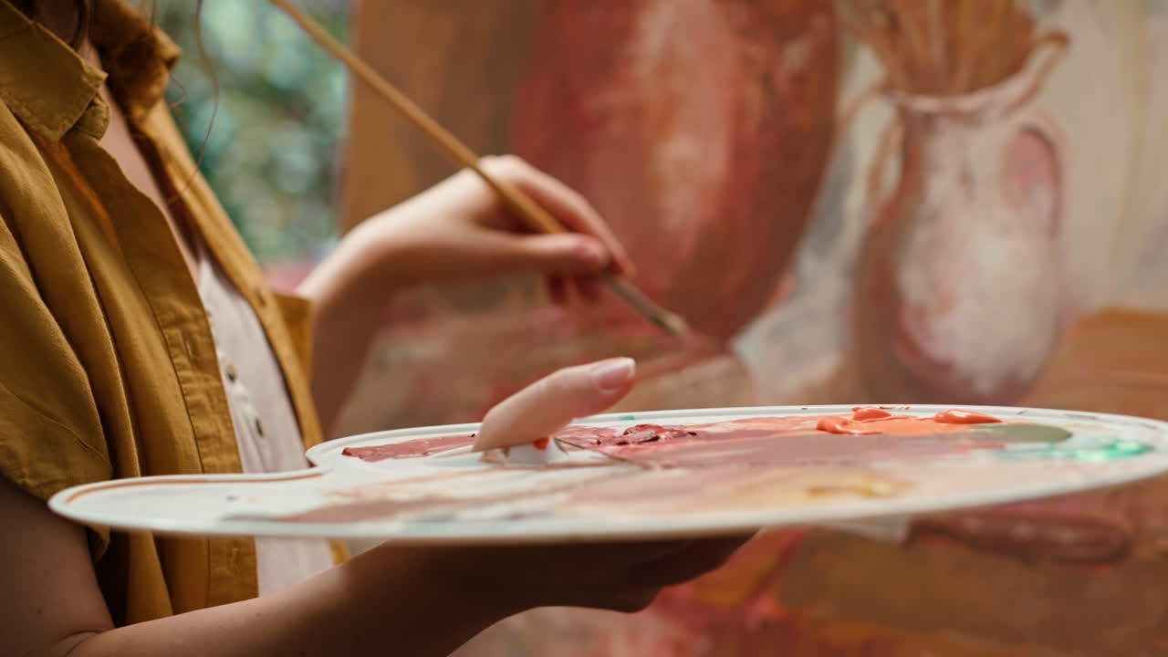 Artist painting a still life