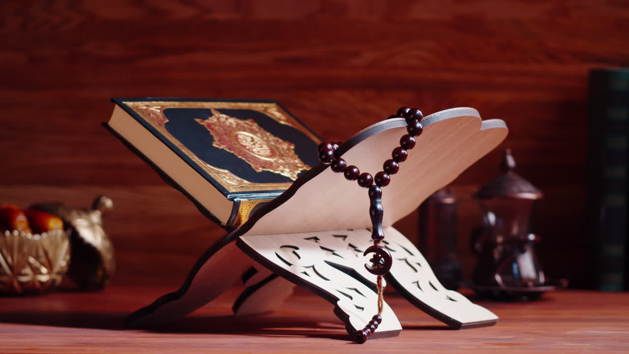 Quran book close-up, praying, islamic religion. Religious holiday Ramadan, holy month. Worship, making traditional prayer to God