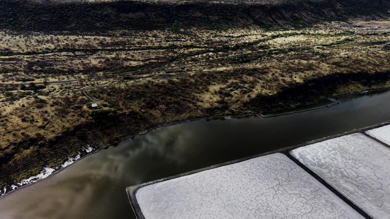 Lake Magadi kenya Sodaash Alkaline water salt lake Trona mineral deposits rift valley kenya . kenyan lake with Trona.