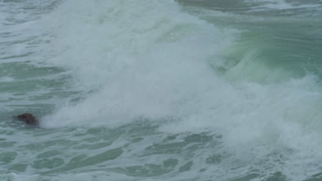 Huge-wave-crashing-on-a-stormy-day