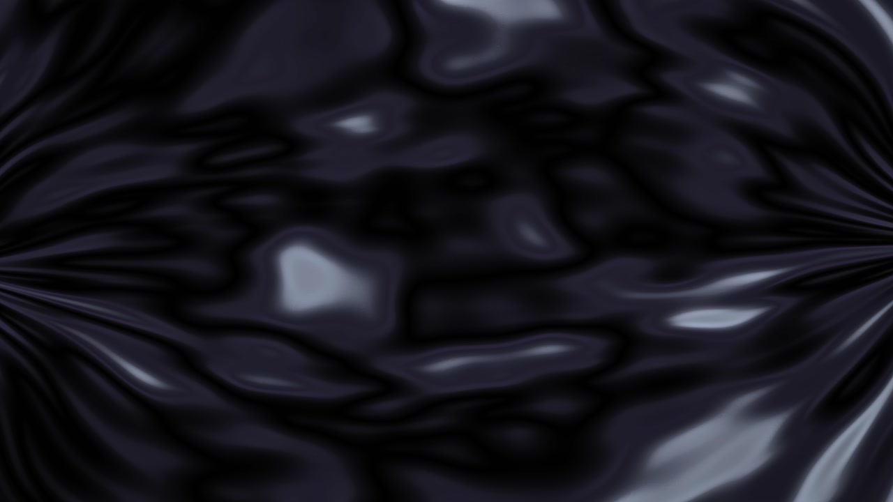 Abstract close view of black liquid surface resembling crude oil texture