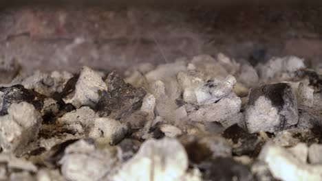 close-up of smoking hot coals