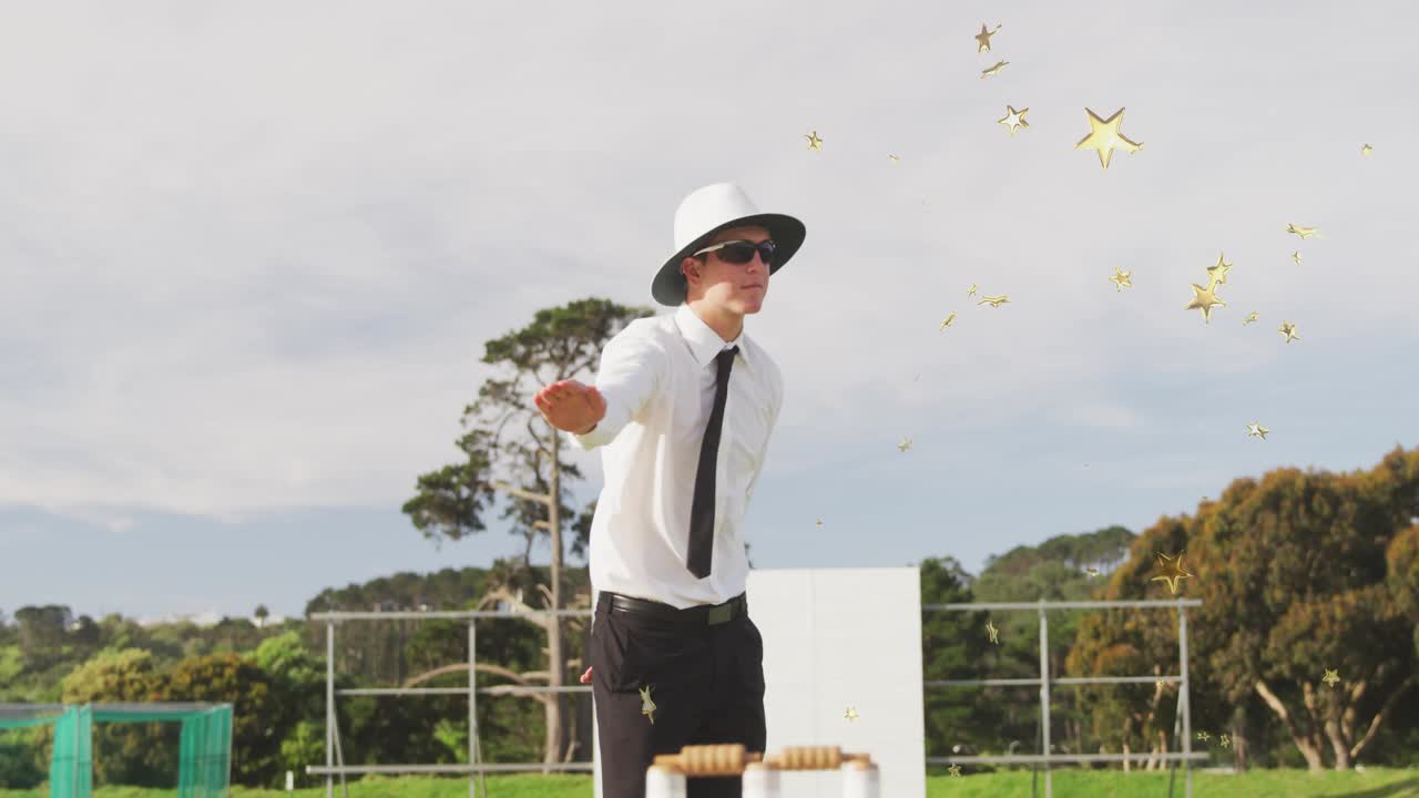 Player crossing field causing cricket official sweeping arm behind wicket and gold stars drifting