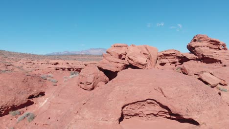 drone going up over red rock