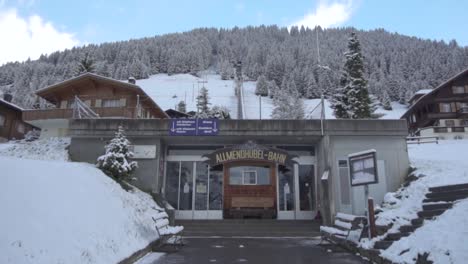 snowy alpine ski resort train station