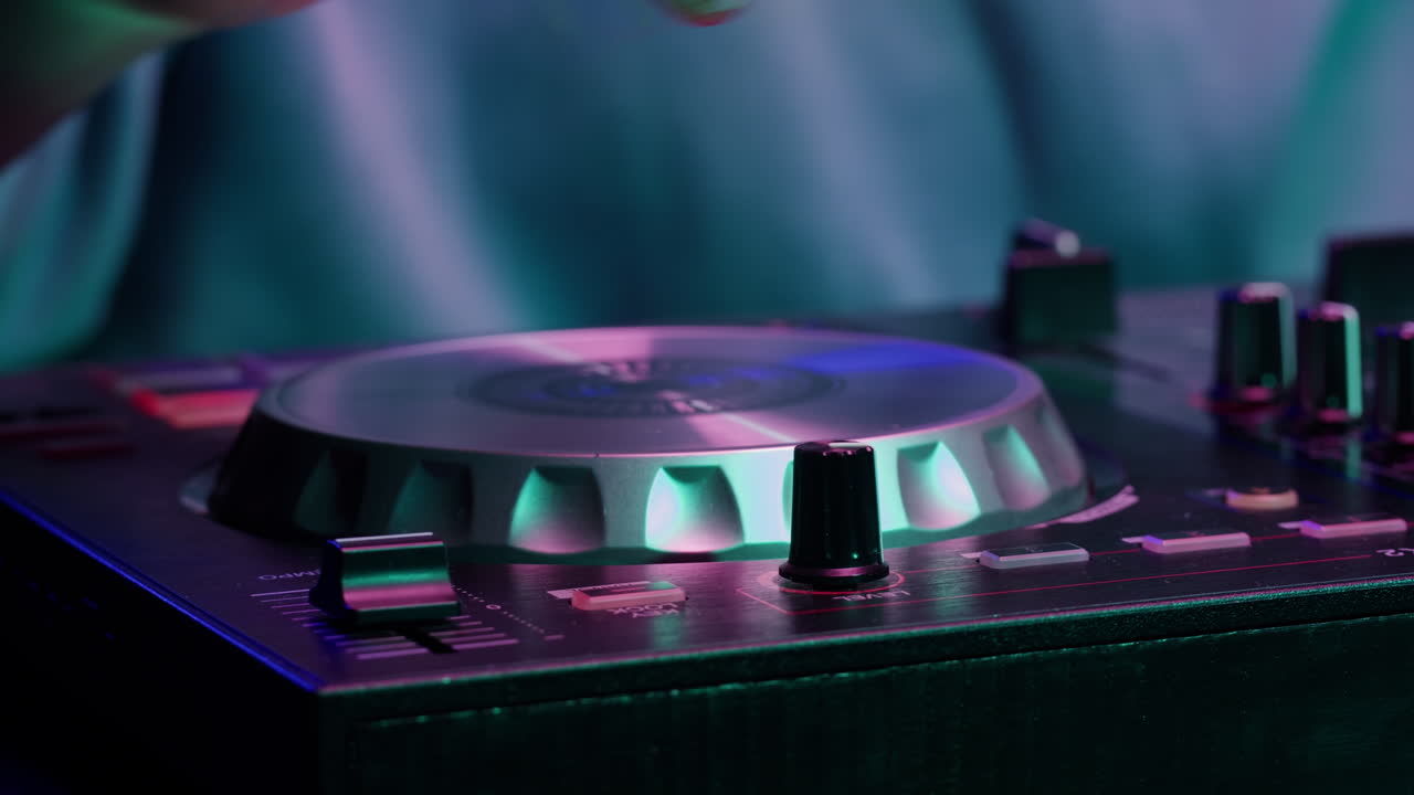 Vibrant DJ Mix Performance Closeup view of hands and equipment during a live music performance, city event, dj set in music techno club
