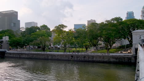 singapore cityscape with river and park