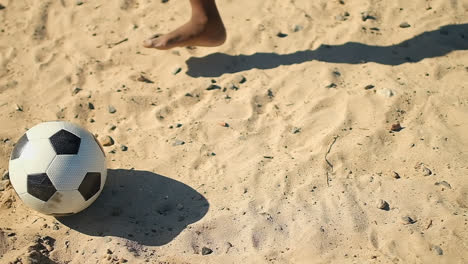 boy kicked and pass the football in the ground 4k