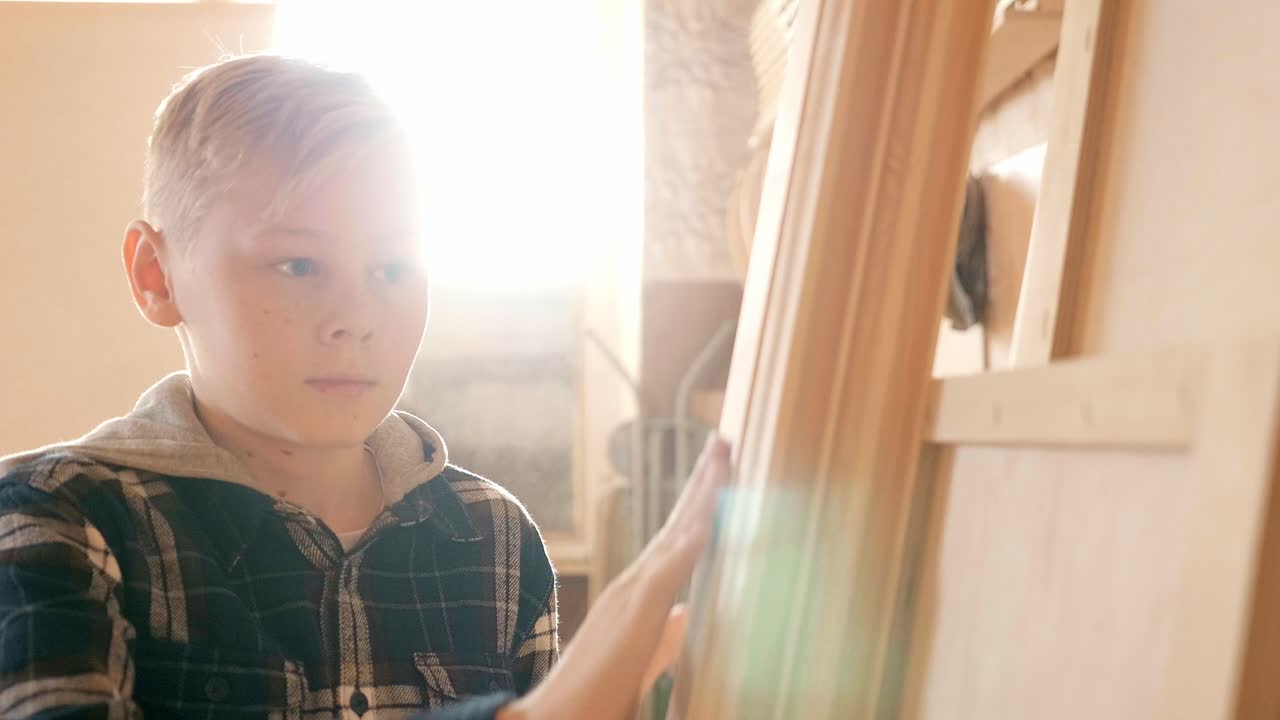 Boy learning woodworking