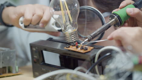 closeup shot of two schoolchildren doing engineering project