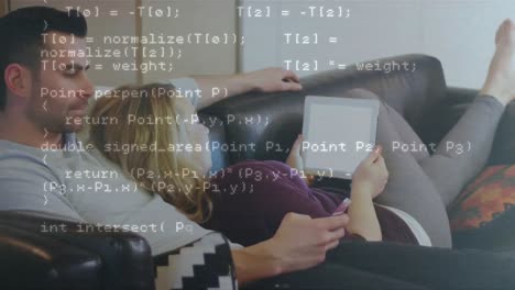 animation of financial data processing over man and woman using smartphone and tablet