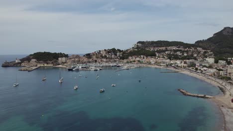 Aerial-orbit-Port-Soller,-Mediterranean-balearic-island-Mallorca,-cloudy-day