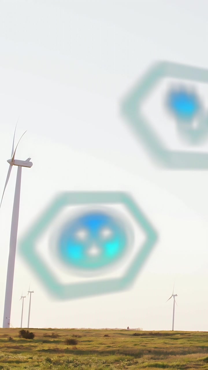 Video verticale: Telecamera che panoramica una turbina con pale che girano e si allontanano, icone esagonali che fluttuano rivelando una pianura.