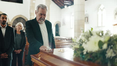 Funeral,-church-and-man-by-coffin-for-mourning