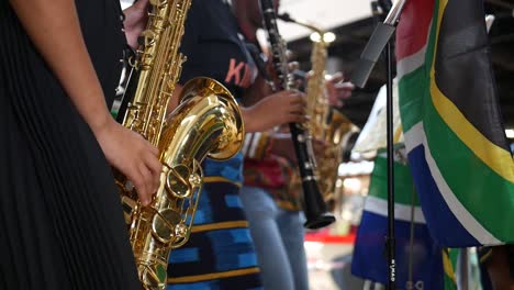 close-up saxophone playing at cultural music event