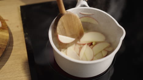 apple cooking in saucepan