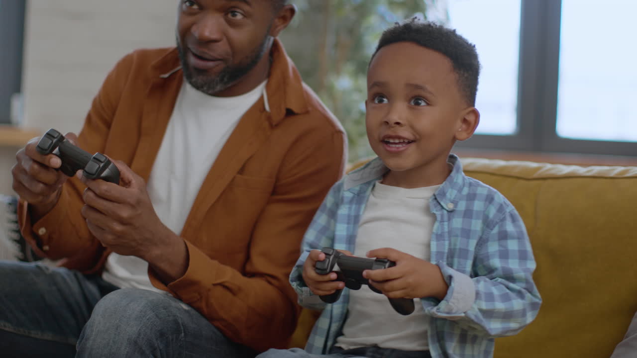 Father and Son Playing Video Games