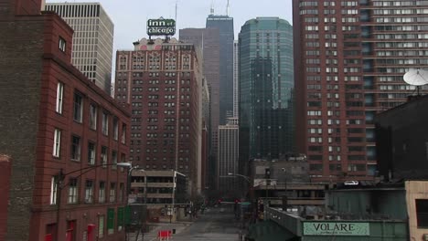 the inn of chicago"" sign stands out in this look at downtown chicago buildings""