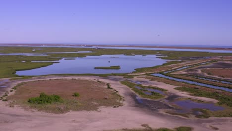 droning towards the lydia ann lighthouse along inlet waterways in aransas pass