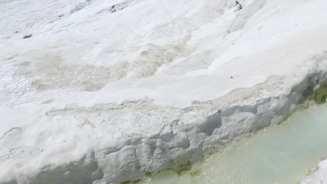 white travertine terraces on a hill - pamukkale