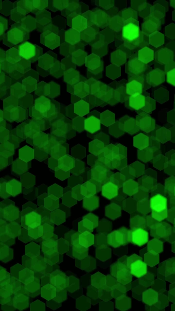 Luci bokeh esagonali verde vibrante che tremolano e pulsano su sfondo nero