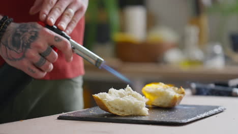 toasting bread with kitchen torch
