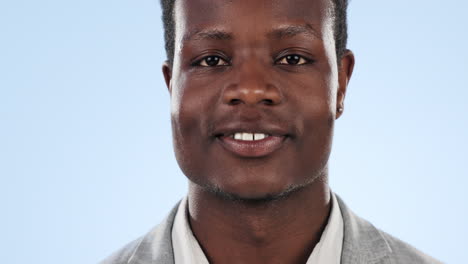 man, smile and pointing at teeth in studio