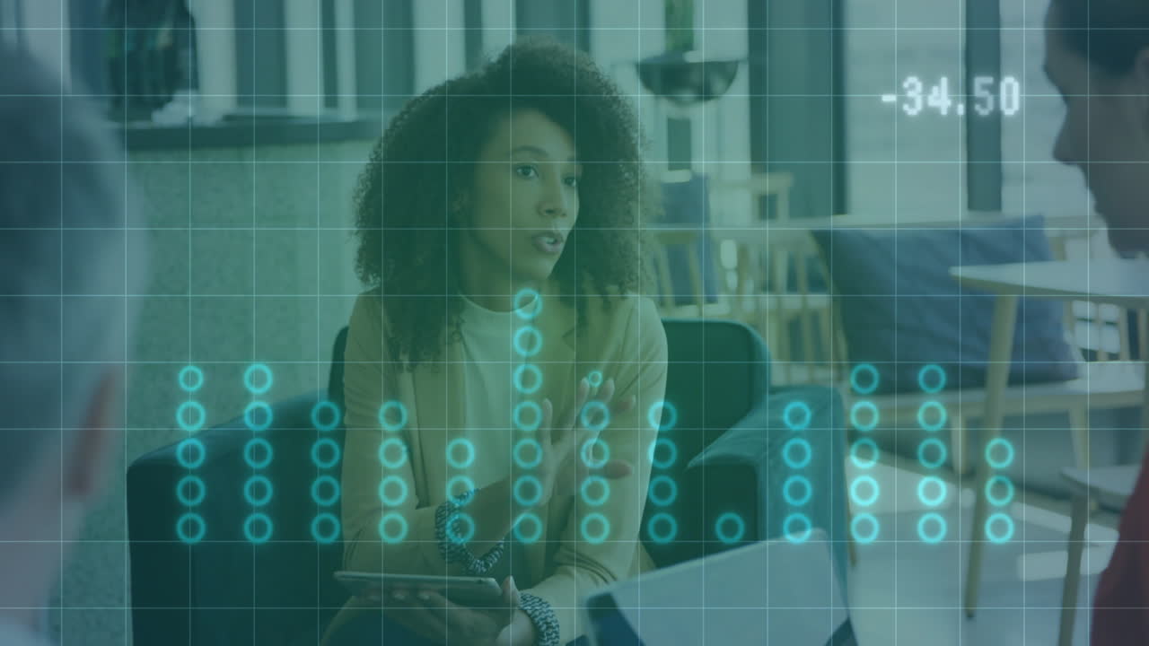 In office, businesswoman discussing with digital data animation overlaying workspace