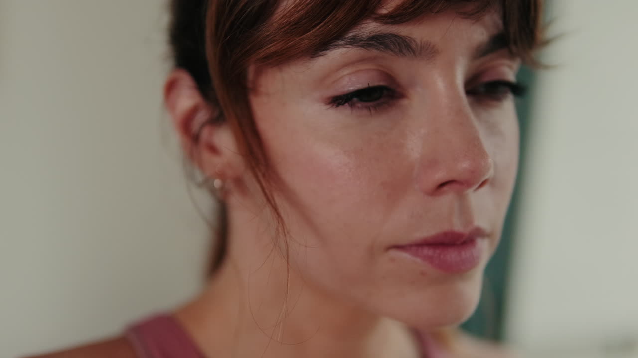 Woman Taking a Break During Home Workout
