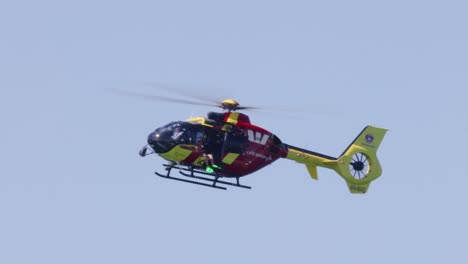 helicopter flying with rescue personnel on board