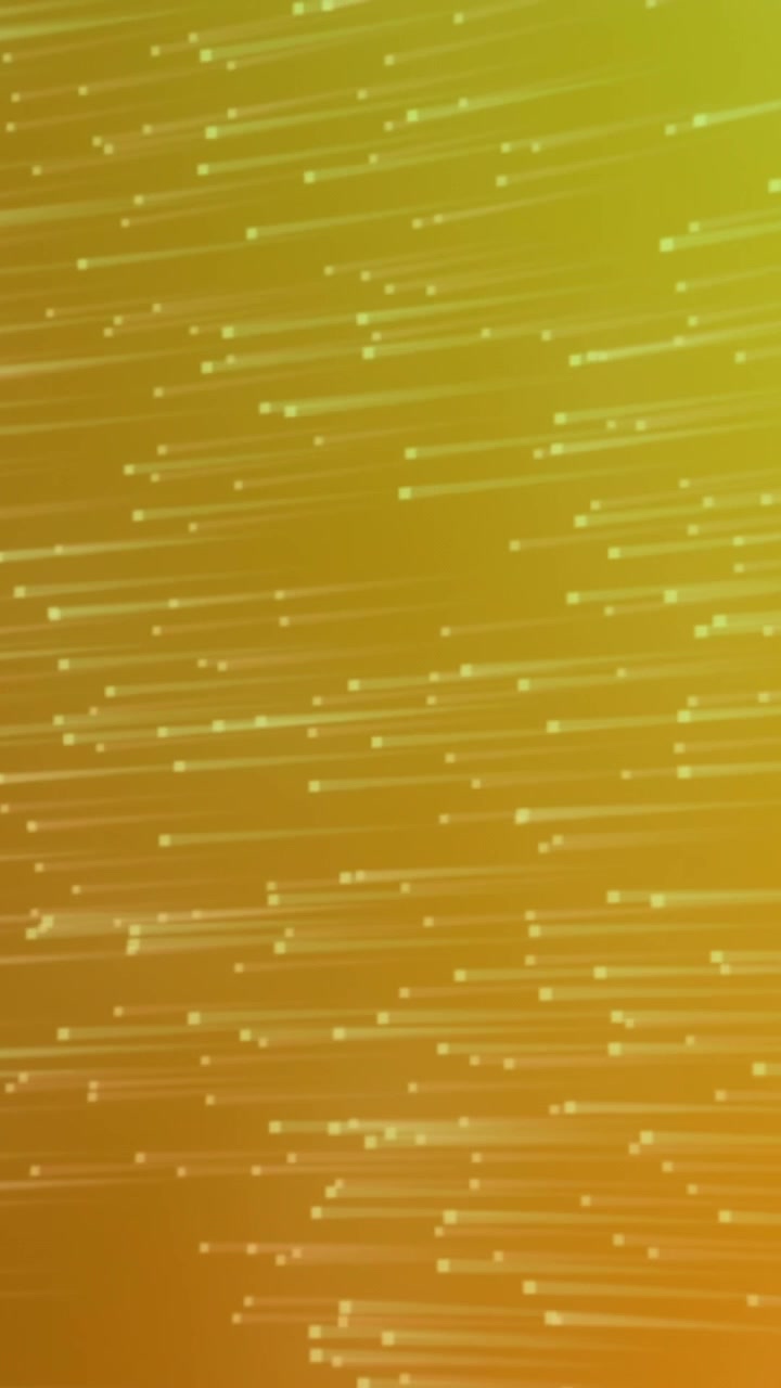 Animation of light spots and trails on yellow background