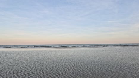 sunset progression over a serene water body