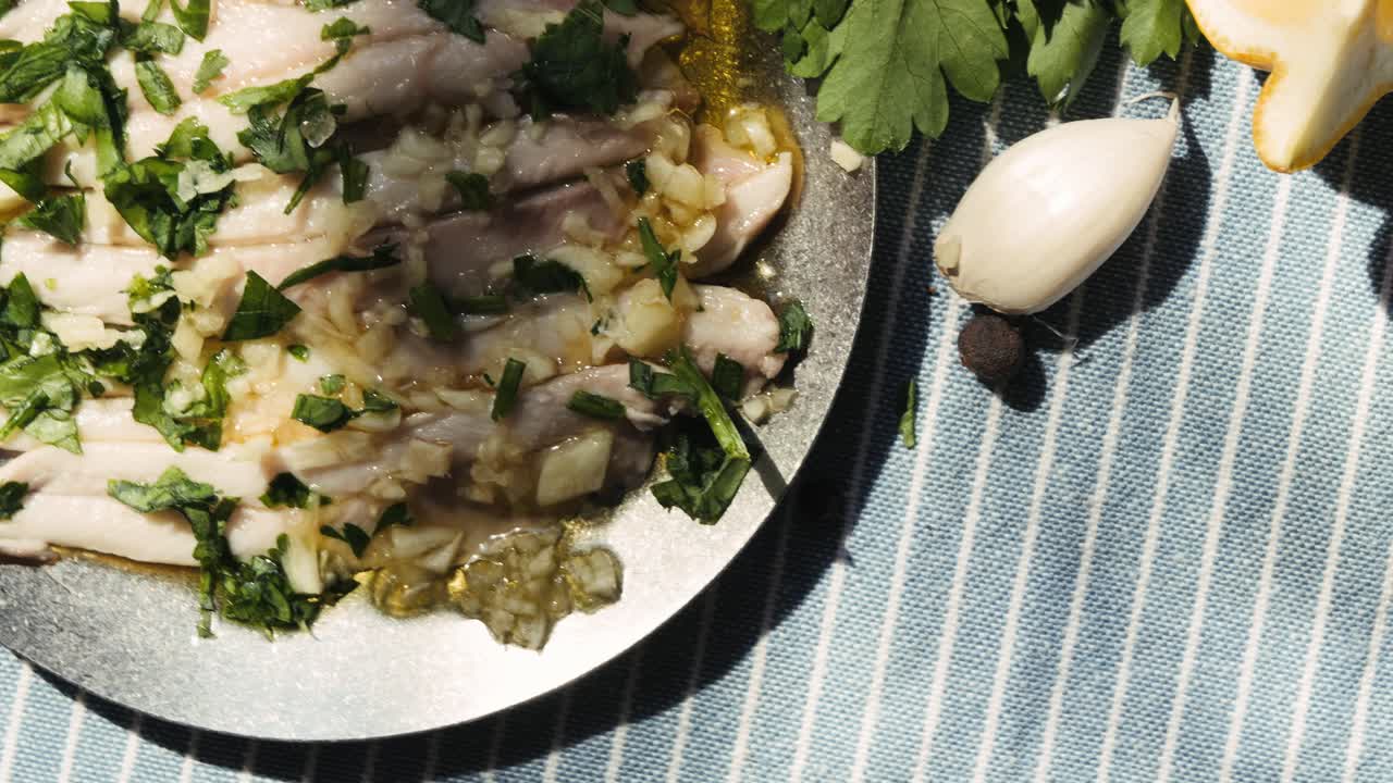 Fresh Sea sardines and Anchovy Fish and Mullus On Display On Ice On Market Store Shop. Seafood Fish Background, close up stand of small salty white fish.