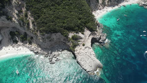 aerial drone video of tropical paradise turquoise coast in the mediterranean, sardinia, costa azzurra