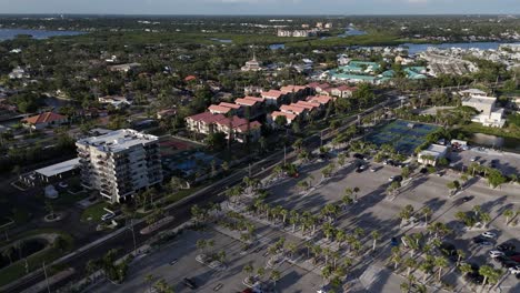 condominiums line the area around siesta key beach and parking lot on the popular beach destination