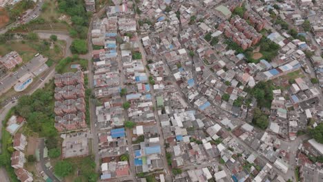 wide aerial footage of a sprawling neighborhood in cali, colombia