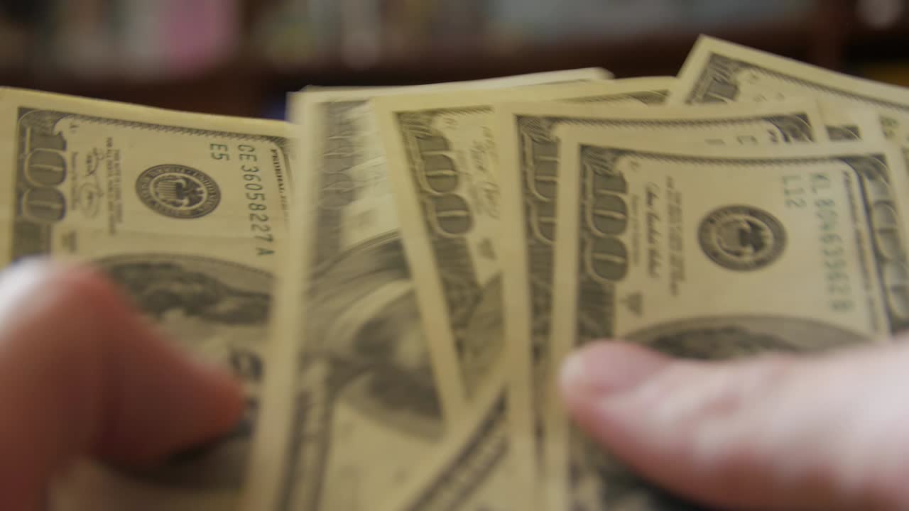 el conteo de 100 dólares