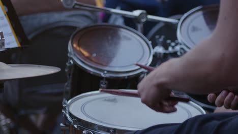 drummer plays on a drummset