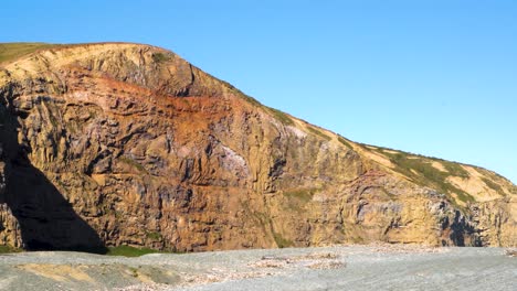 Sunset-on-seaside-cliffs-and-sea-waves