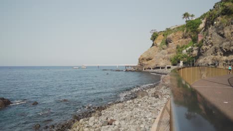 coastal walkway with runner