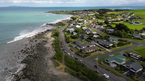 aerial, luxurious ocean side houses on a cliff in riverton, new zealand