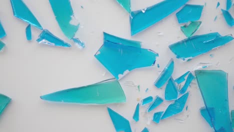 broken pieces of blue candy glass