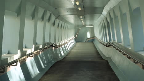 walking the vintage pedestrian bridge in hong kong