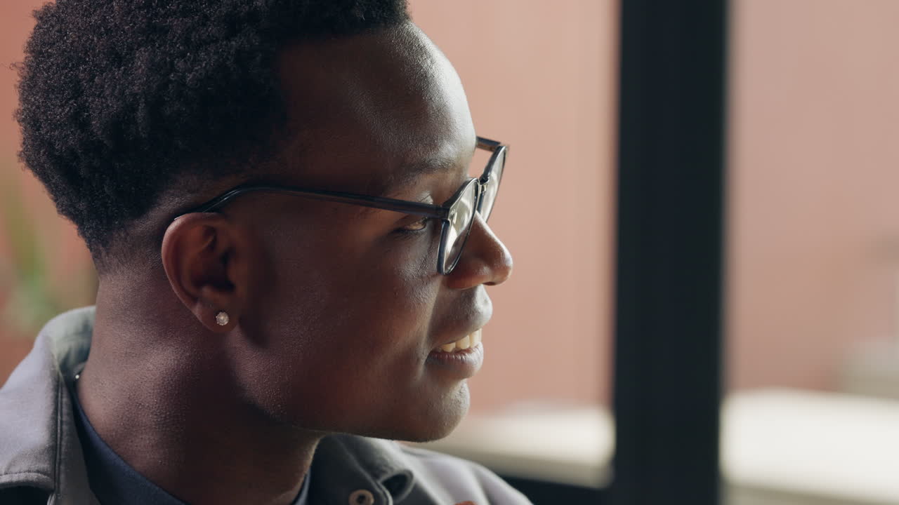 Portrait of an African American man with glasses
