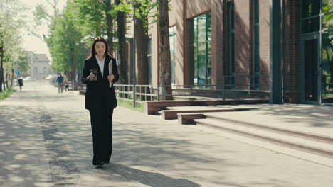 businesswoman walking in city