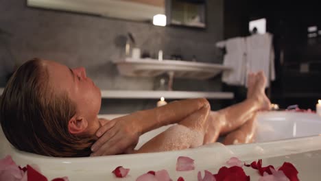 Caucasian-woman-taking-bath-in-hotel